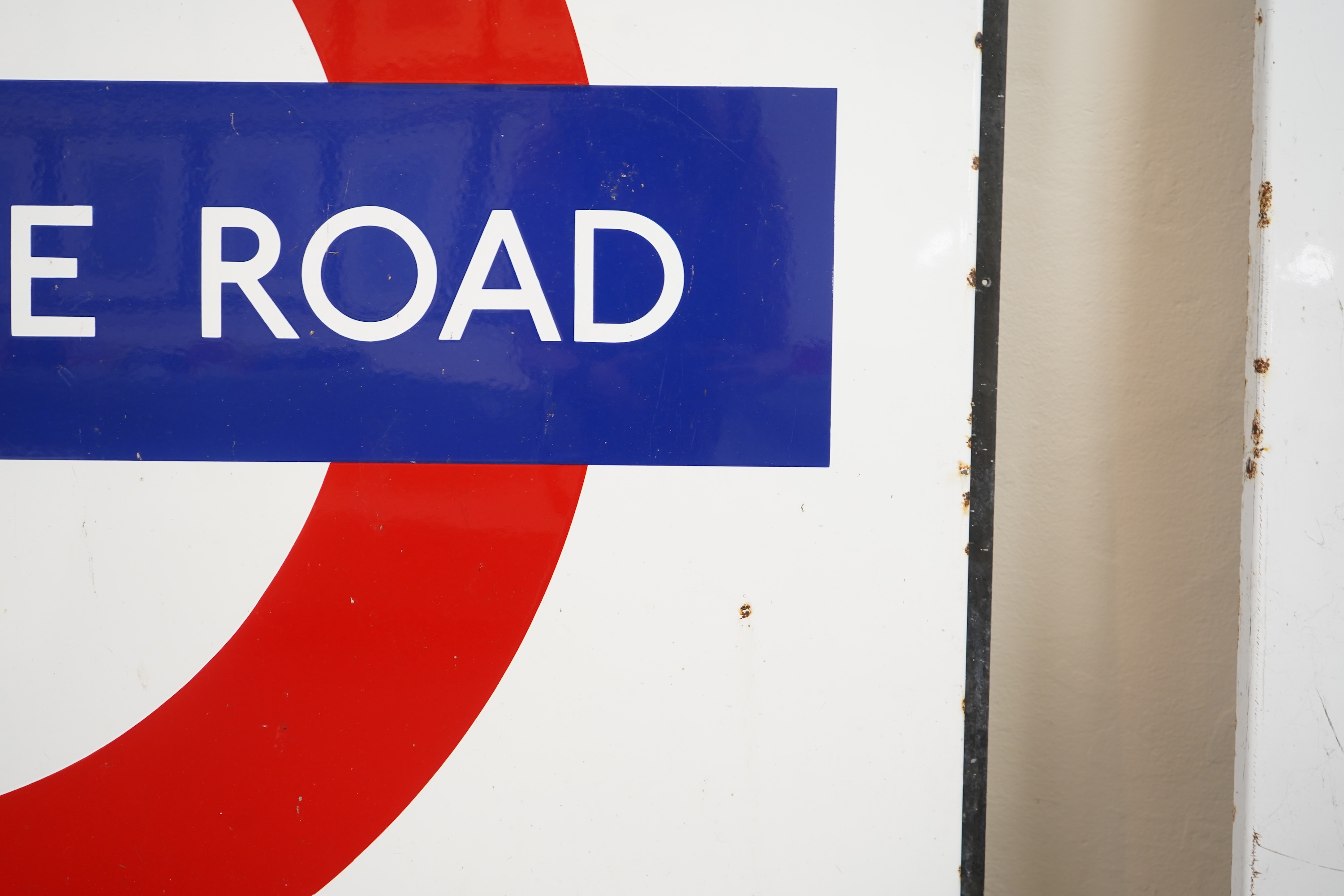 A 1950s/60s London Underground enamel bullseye station sign for Blackhorse Road by Burnham and Co., 107cm wide, 107cm high, attached to a slim angle iron frame, overall dimensions 131cm wide, 111cm high